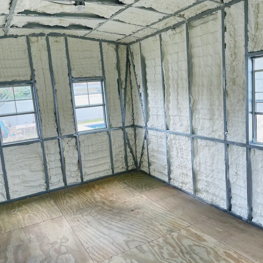 Closed-cell spray foam insulation applied to wall cavities in a residential project in Glocester